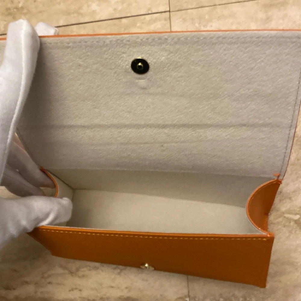 Tory Burch “Cranberry” sunglasses - New with case and dust bag.